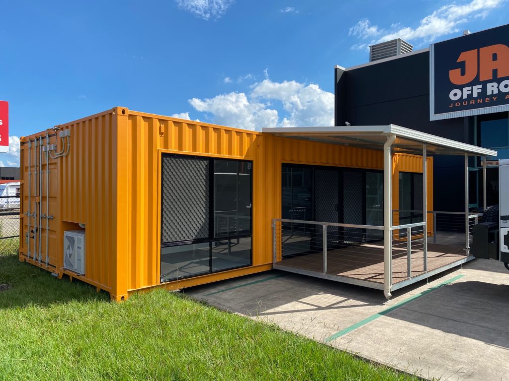 Shipping container converted into a sales office for JAWA Campers