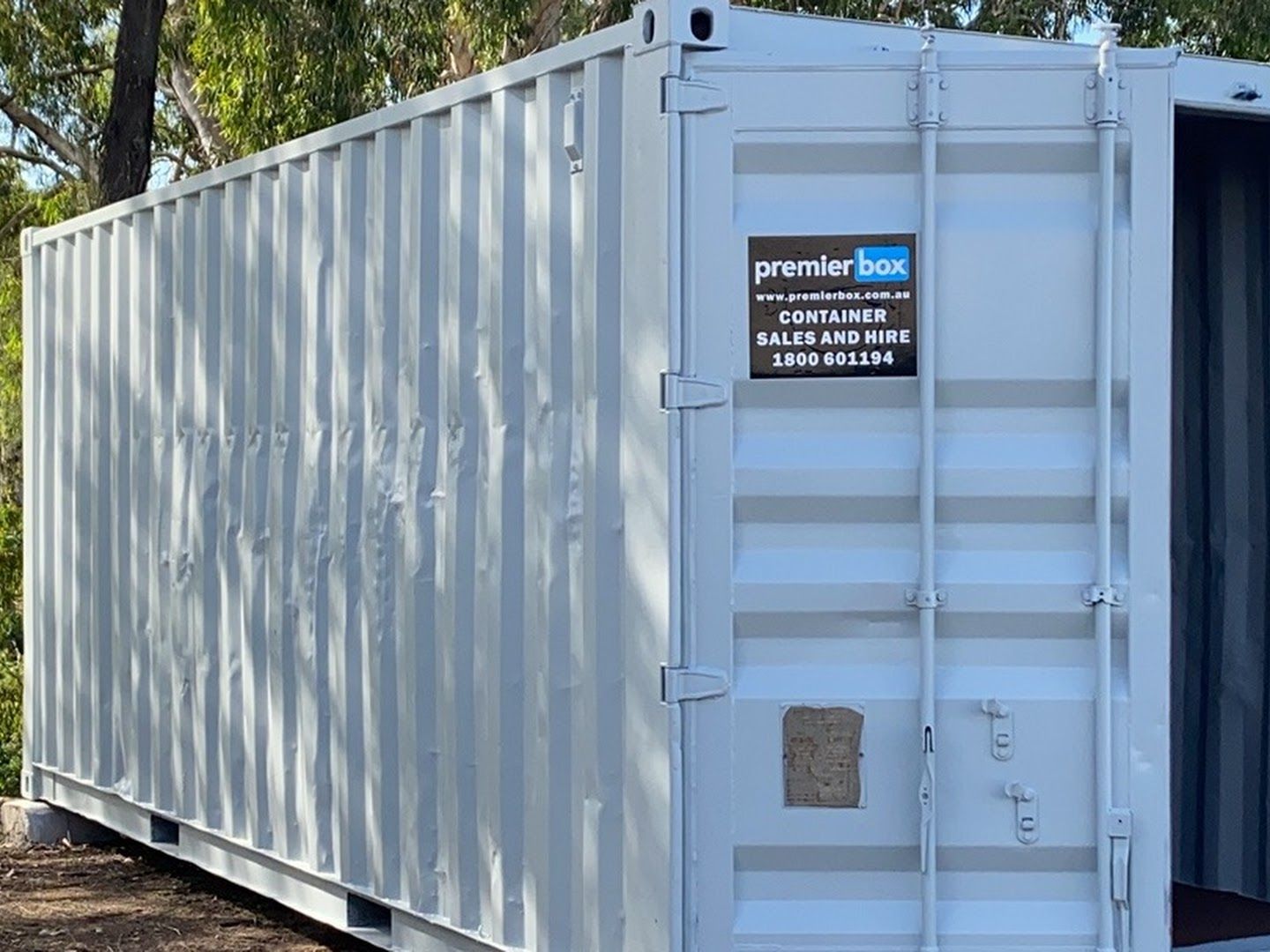 Light grey premierbox 20ft storage container in the yard