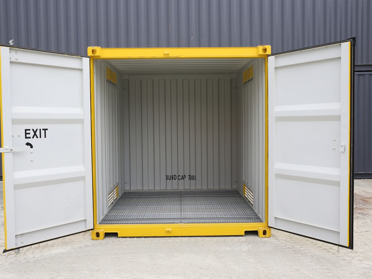 Dangerous goods container with doors open showing the mesh floor over the bund