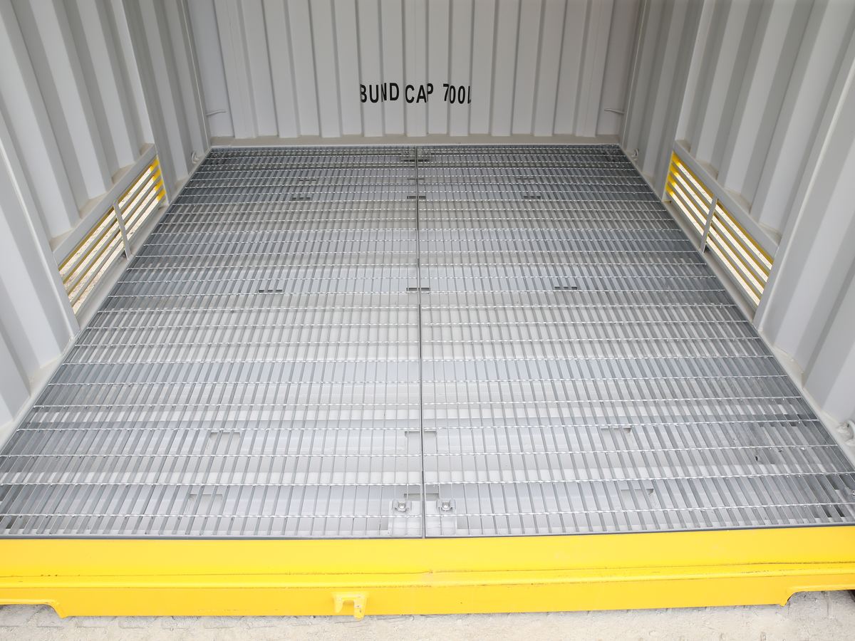Close view of the bunded floor grating and wall vents inside a dangerous goods container