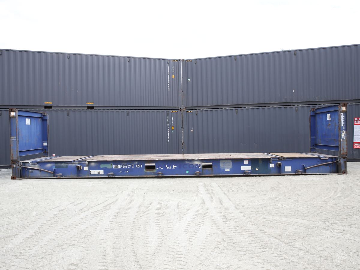 Blue flat rack container on the depot ground with both ends upright