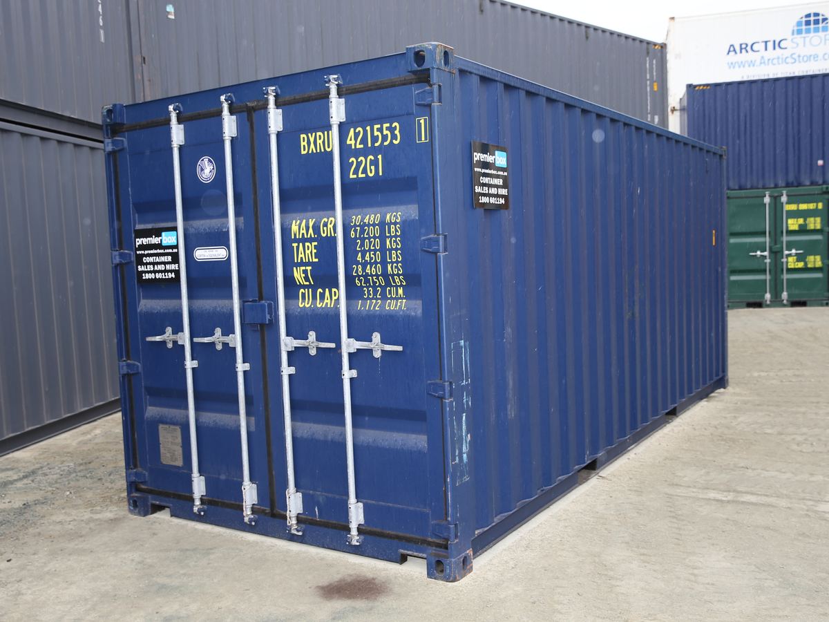 Navy blue 20ft general purpose container in the depot yard