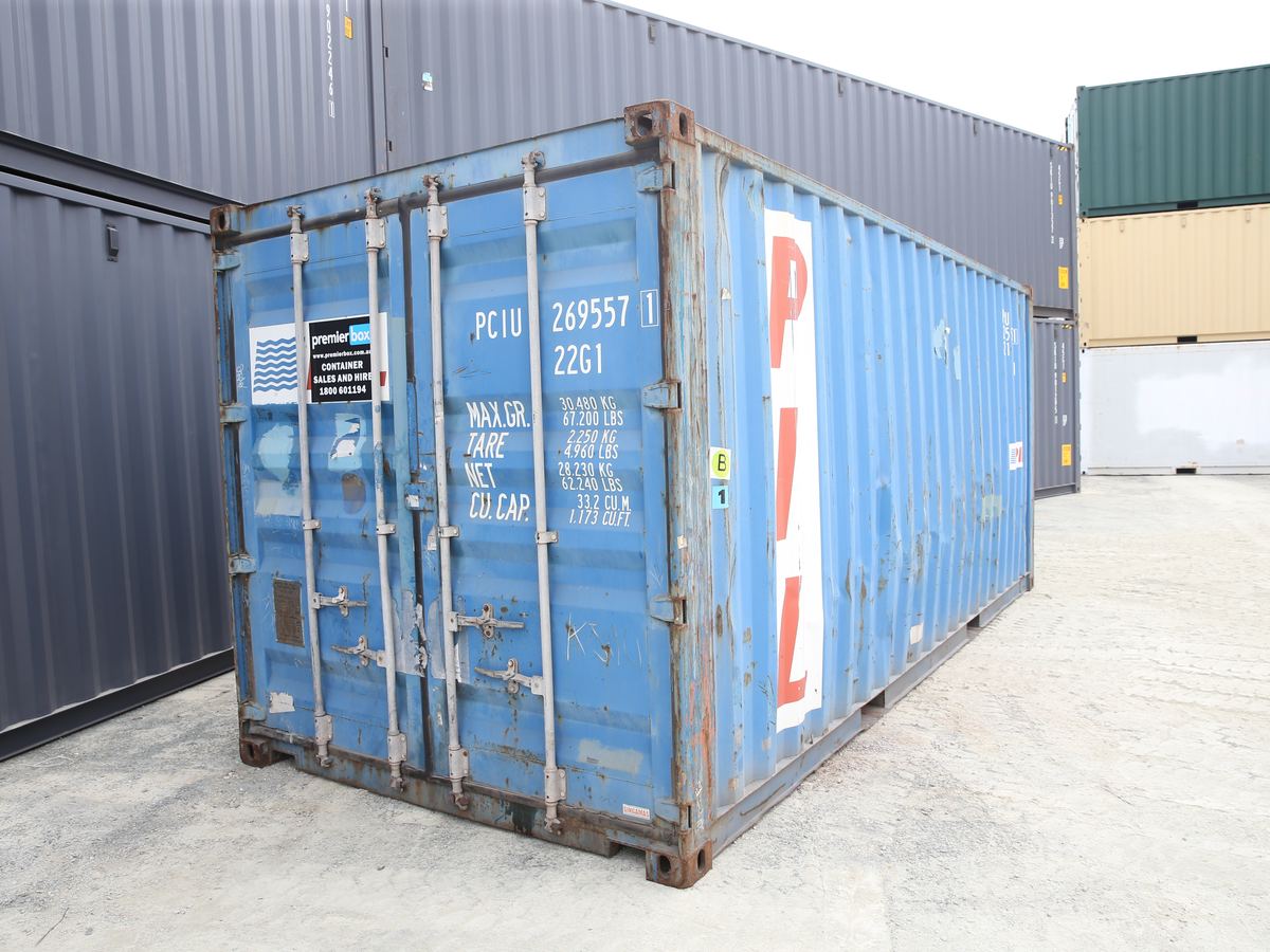 Used blue 20ft container showing wear on the doors and frame