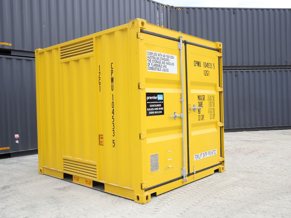 Yellow 10ft dangerous goods container with vented sides at the depot