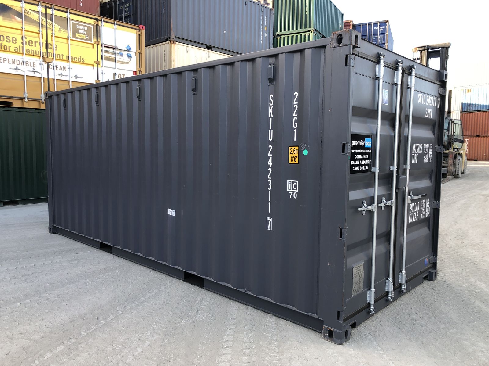 Charcoal 20ft premierbox hire container in the depot yard