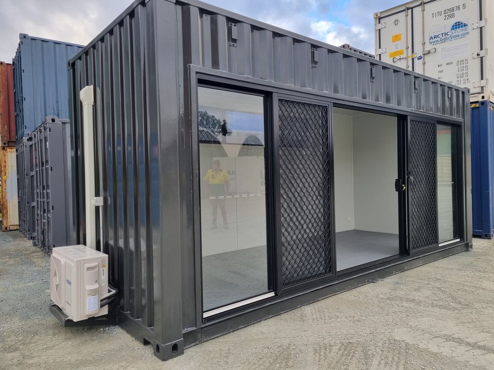 Charcoal container dog salon with glazed sliding doors and an air conditioner