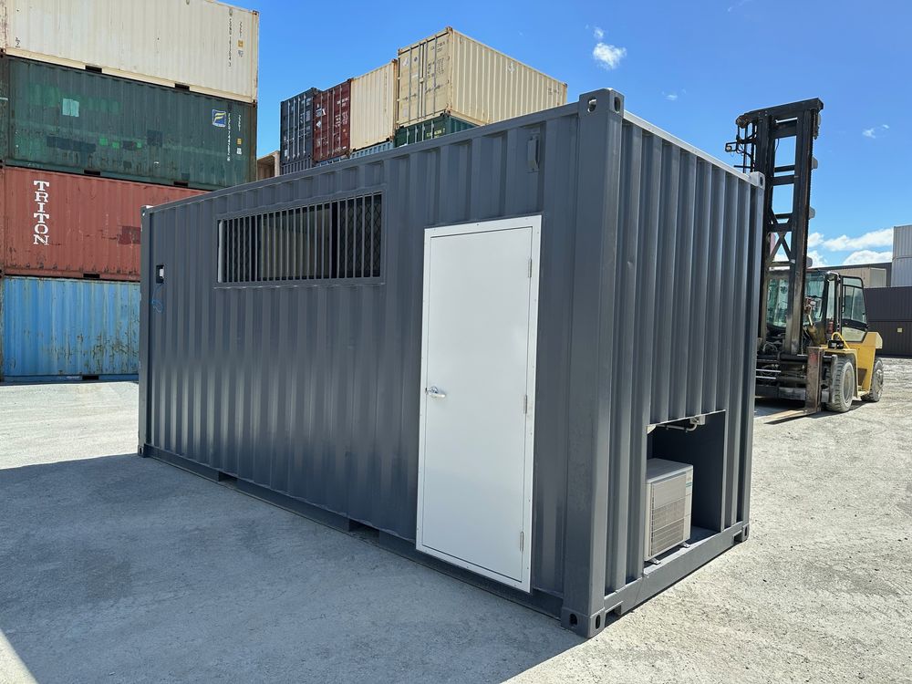Grey 20ft site office container with a PA door, window and air conditioner