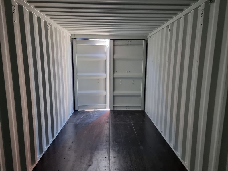 Empty interior of a hire container viewed from the open doors