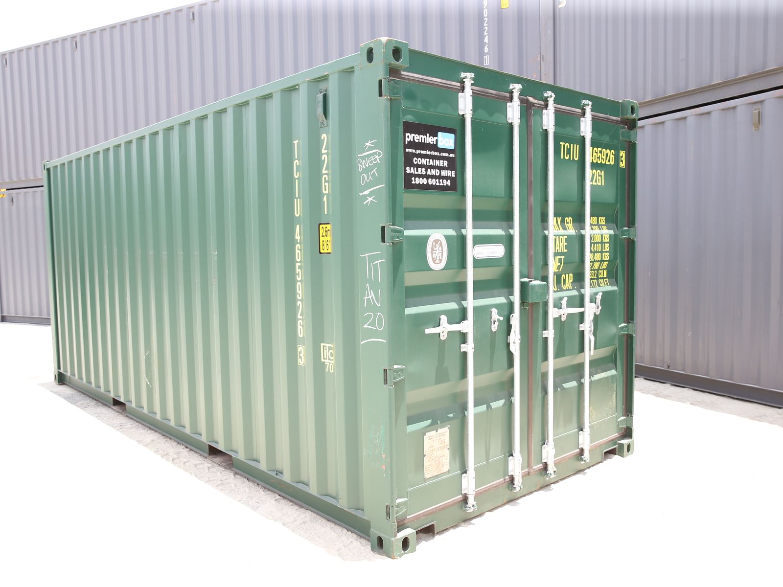 Green 20ft single trip shipping container in a container yard